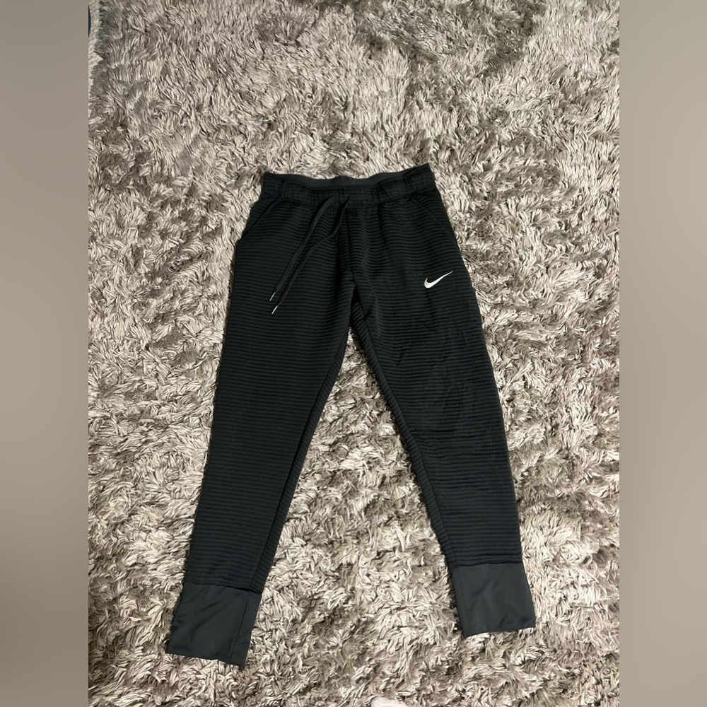 Grey Nike sweatpants